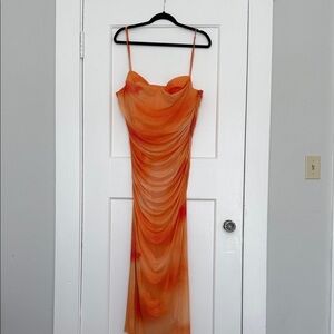Orange body con ruching maxi dress with bralette detail and skinny straps.